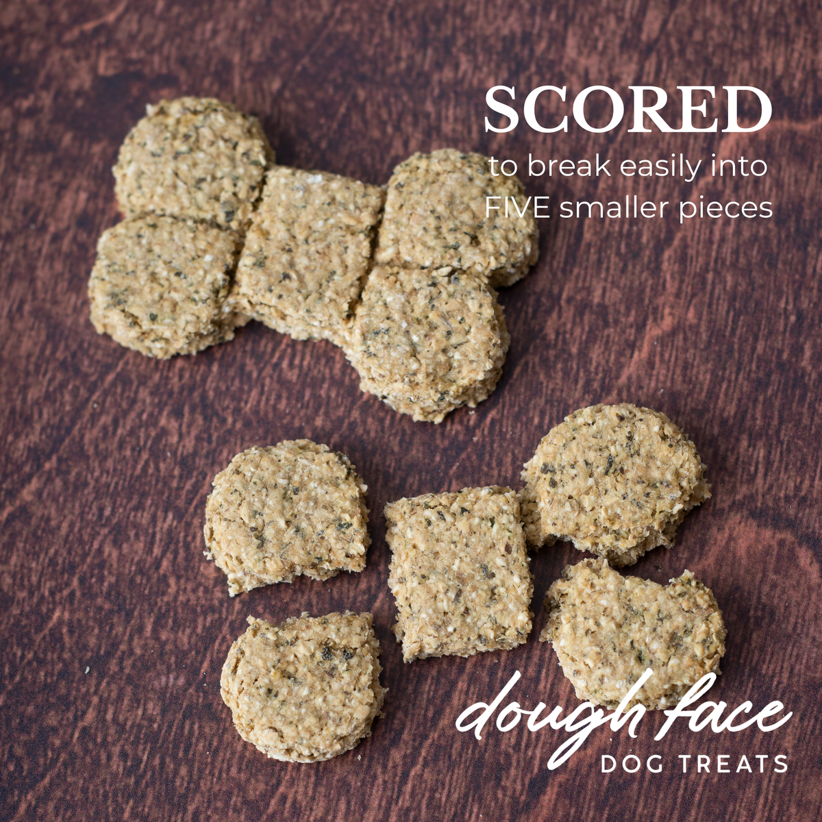 Two bone shaped dog treats on a wood textured background. One treat is intact, the other is broken into five pieces. The words "SCORED to break easily into FIVE smaller pieces" are in the top right hand corner and "dough face DOG TREATS" in the bottom right hand corner.