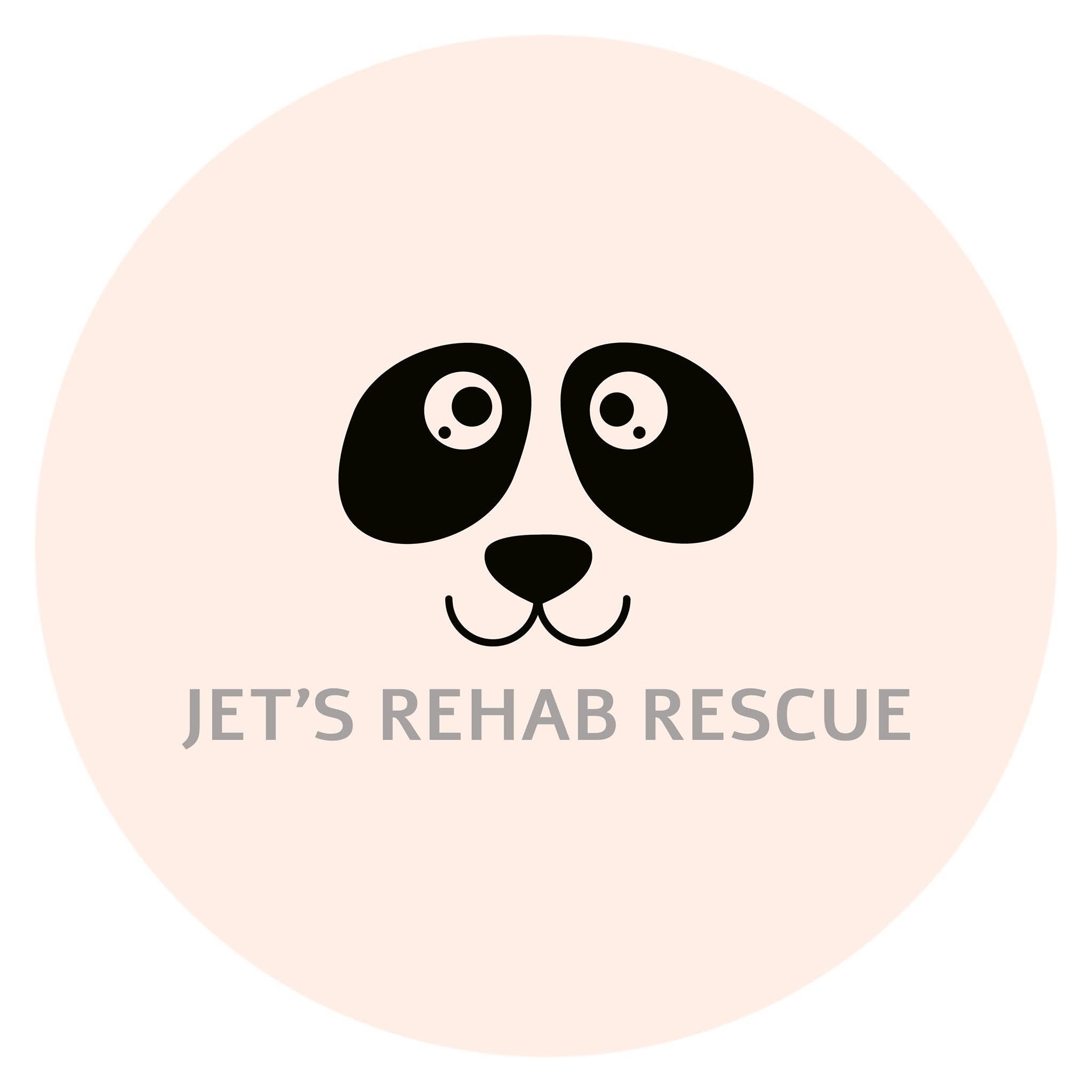 A circular logo featuring a black cartoon dog face on a pale blush pink circle, with the text 'JET'S REHAB RESCUE' below it on a white background.