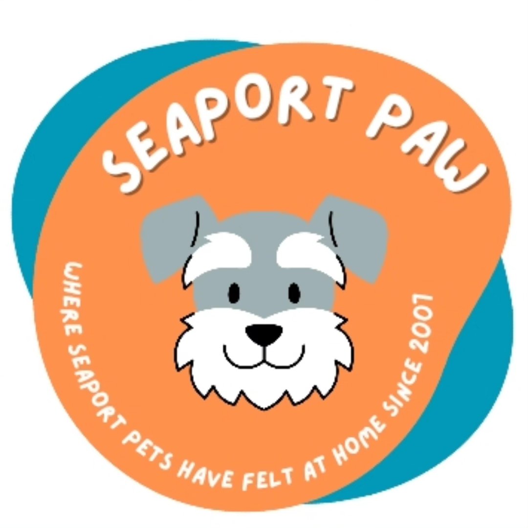 A circular logo for 'SEAPORT PAW' featuring a cartoon gray and white dog face in the center, with teal and orange abstract shapes behind it on a white background.