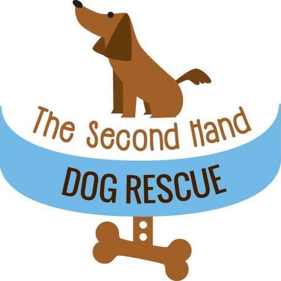 A logo-style graphic featuring a brown cartoon dog above a light blue curved banner that reads 'The Second Hand DOG RESCUE,' with a brown bone below on a white background.