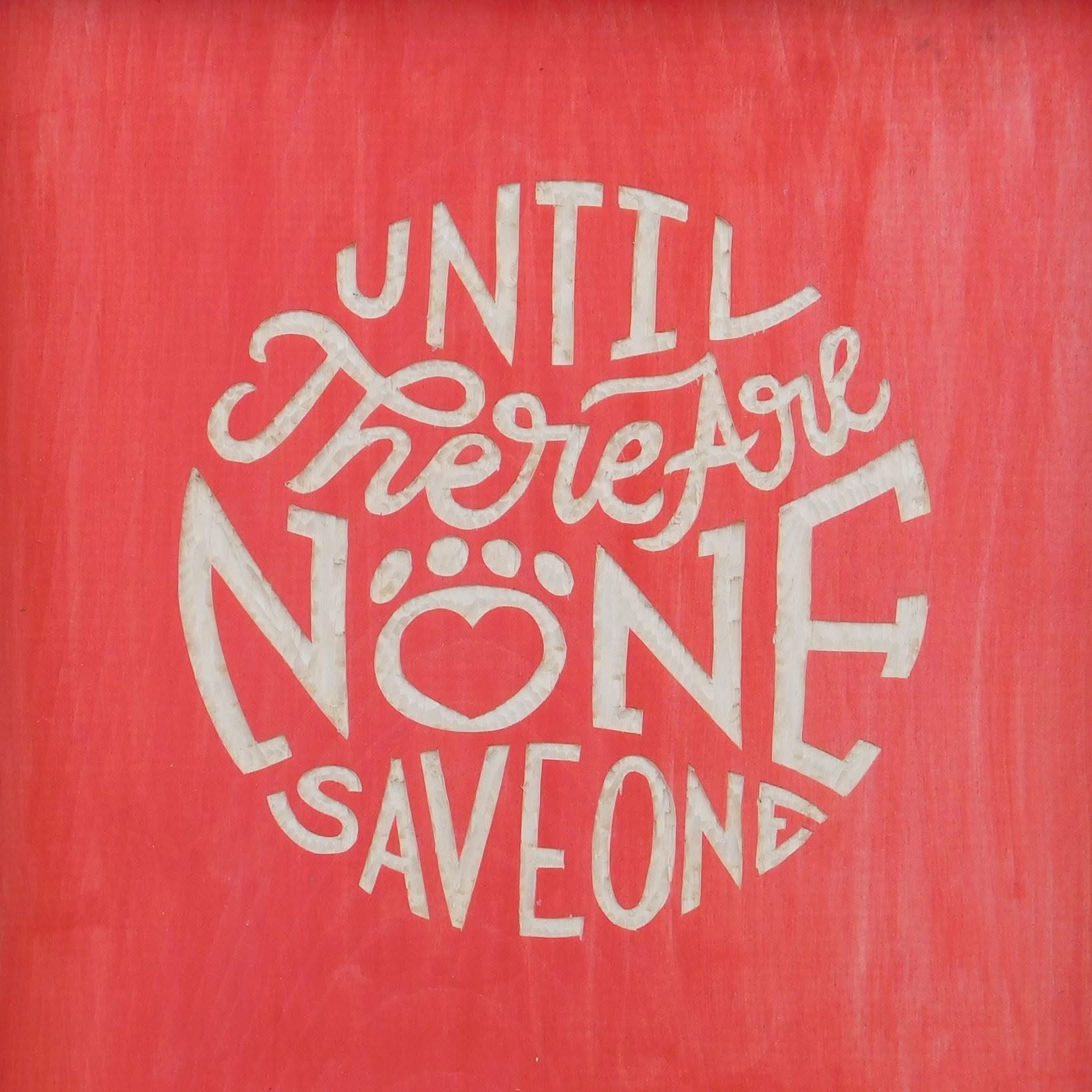 A square red wall art print or canvas featuring the phrase 'UNTIL THERE ARE NONE SAVE ONE' in large, stylized white lettering arranged in a circle.