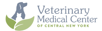 Logo for Veterinary Medical Center of Central New York, featuring a dark blue dog silhouette inside a green leaf shape on the left, with the center name in gray and the tagline 'OF CENTRAL NEW YORK' in green on a white background.